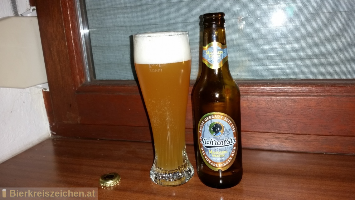 Foto eines Bieres der Marke Mohren Mandarin Weizen aus der Brauerei Mohrenbrauerei