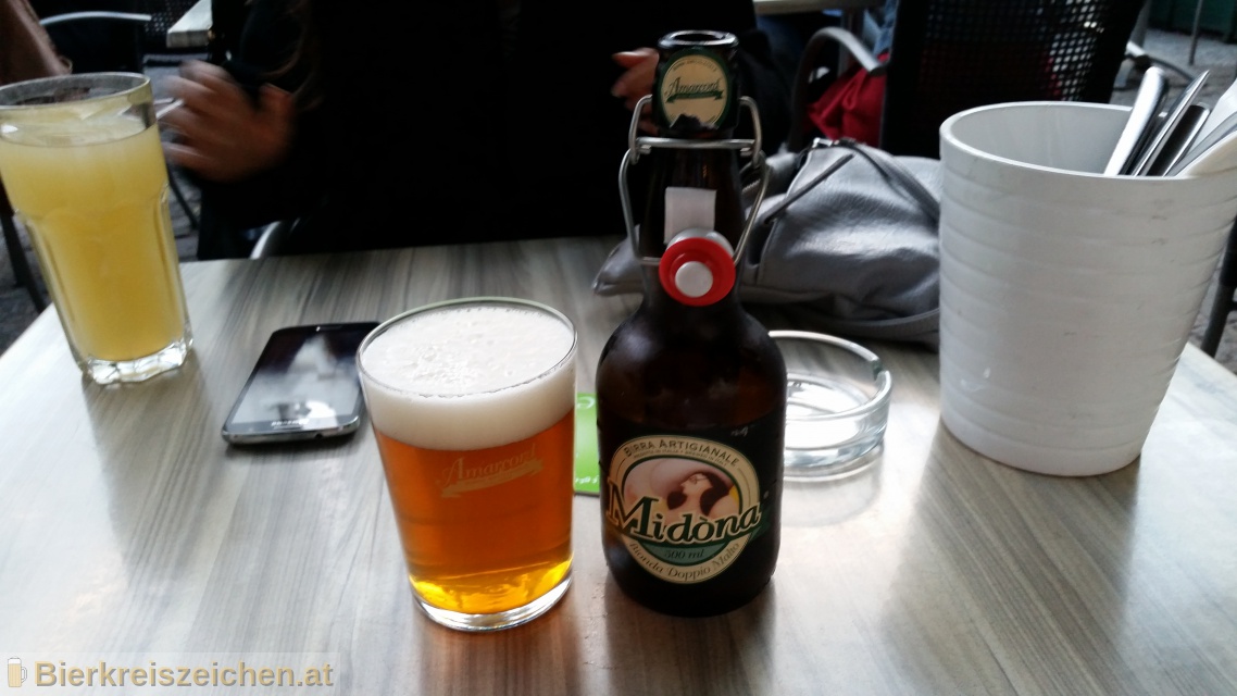 Foto eines Bieres der Marke La Midna aus der Brauerei Birra Amarcord