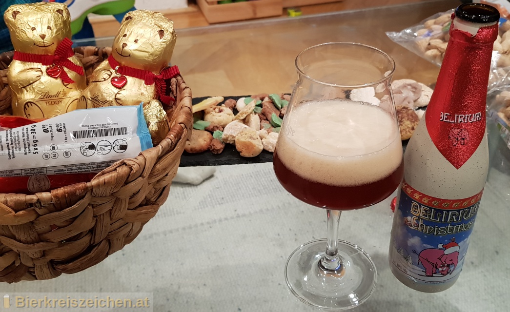 Foto eines Bieres der Marke Delirium Christmas aus der Brauerei Brouwerij Huyghe