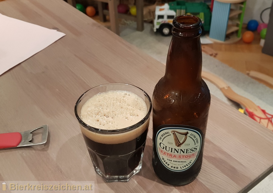 Foto eines Bieres der Marke Guinness Extra Stout aus der Brauerei Guinness