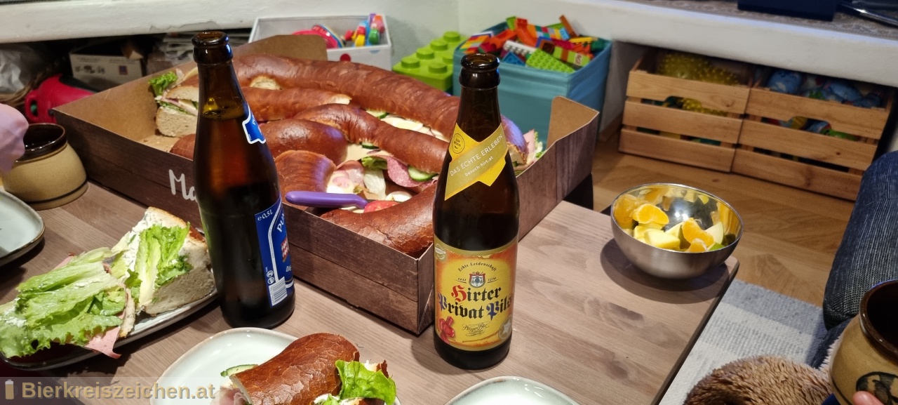 Foto eines Bieres der Marke Hirter Privat Pils aus der Brauerei Brauerei Hirt