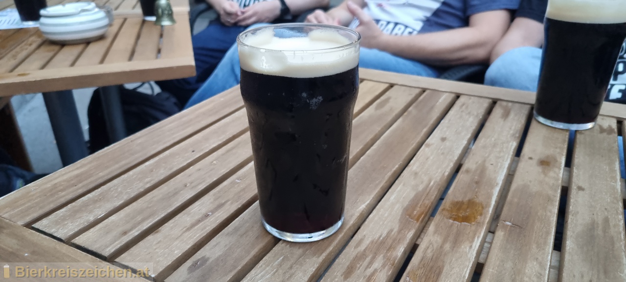 Foto eines Bieres der Marke Guinness Draught Stout aus der Brauerei Guinness