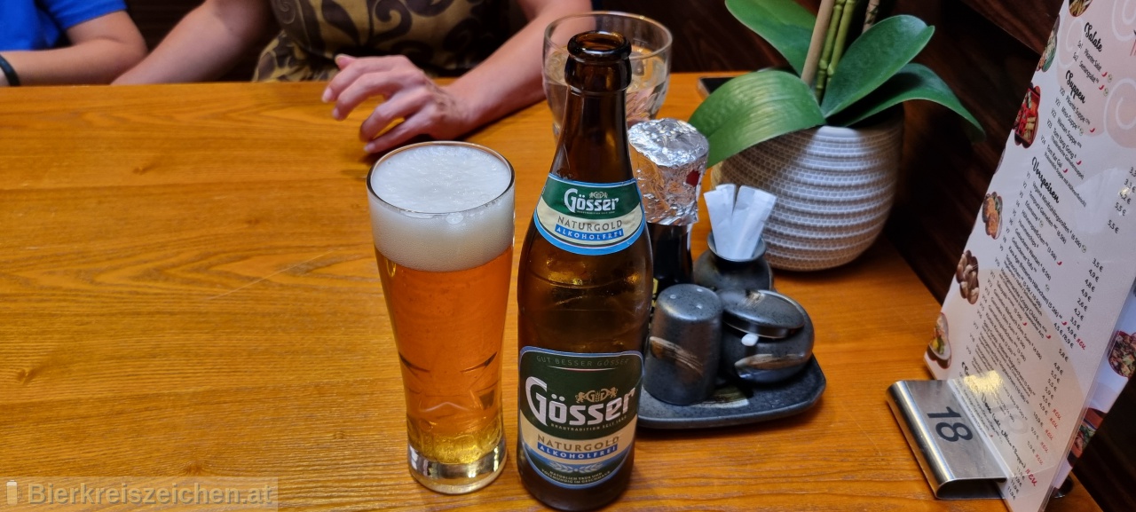 Foto eines Bieres der Marke Gsser NaturGold aus der Brauerei Brauerei Gss