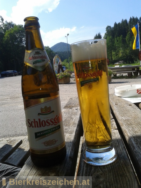 Foto eines Bieres der Marke Schlossgold aus der Brauerei Brau Union