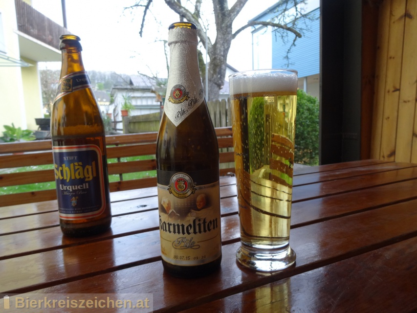 Foto eines Bieres der Marke Karmeliten Pils aus der Brauerei Karmeliten Brauerei