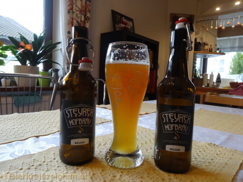 Foto eines Bieres der Marke Weizen aus der Brauerei Steyrer Hofbru