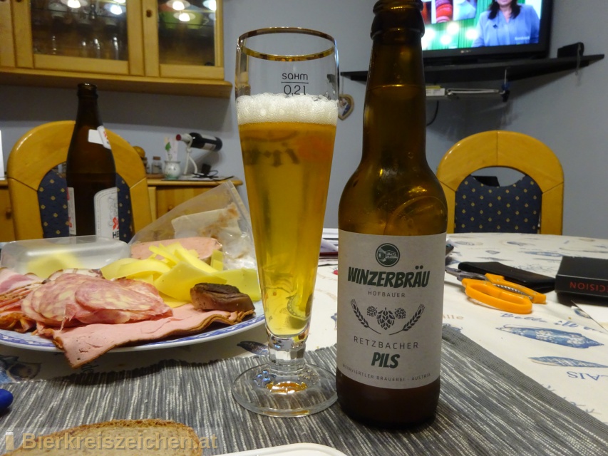 Foto eines Bieres der Marke Retzbacher Pils aus der Brauerei Winzerbräu