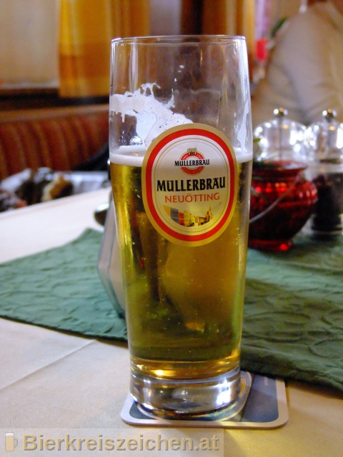 Foto eines Bieres der Marke Müllerbräu Neuöttinger Export aus der Brauerei Müllerbräu Neuötting