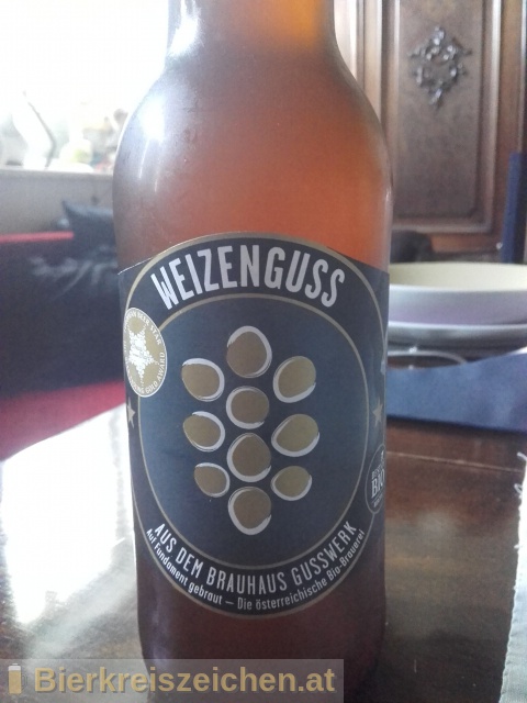 Foto eines Bieres der Marke Weizenguss aus der Brauerei Brauerei Gusswerk